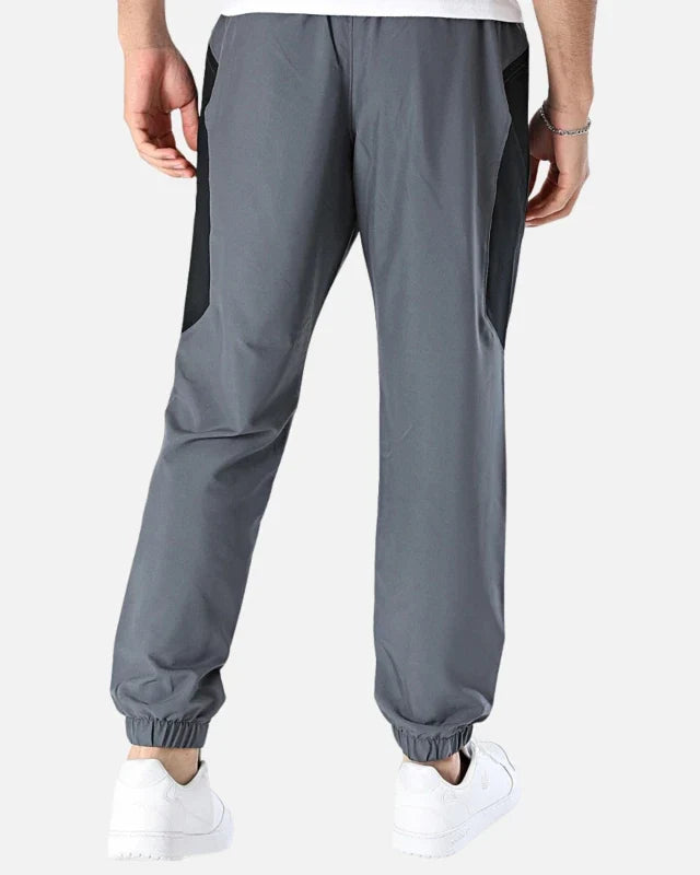 Pantalon Under Armour Tech Sport - Gris