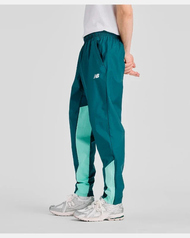 Pantalon New Balance Utility Woven - Vert